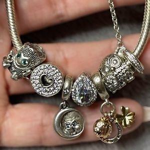 Pandora snake bracelet with charms